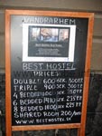 Sign with the prices of the Best Hostel Old Town