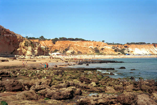 Beach section with rocks at the background