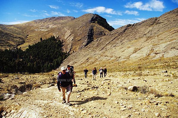 On a pathless complex the sudorific way continues uphill to the first pass of the day
