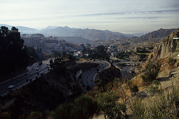 View to the lower city districts of La Paz, the swimming stadion is visible at the upper left