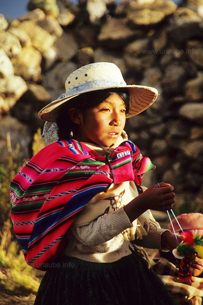 A young Bolivian girl with a colourful coat.