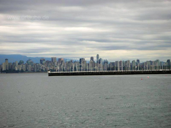 The skyline of Vancouver under a cloudy sky
