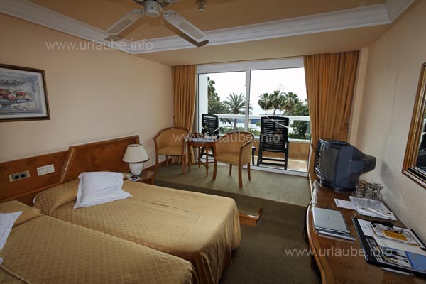 The furniture of the room appeared to be very usedk.