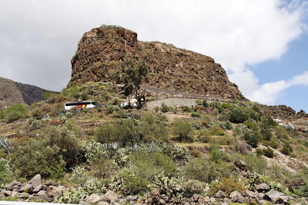 The hill marks the end of the road and accommodates the cave restaurant Tagoror.
