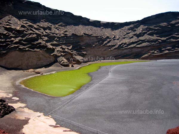 The famous Lago Verde by El Golfo with the sand beach in the front