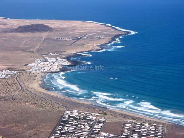 View down to the bay of Famara from the view point Ermita de las Nieves