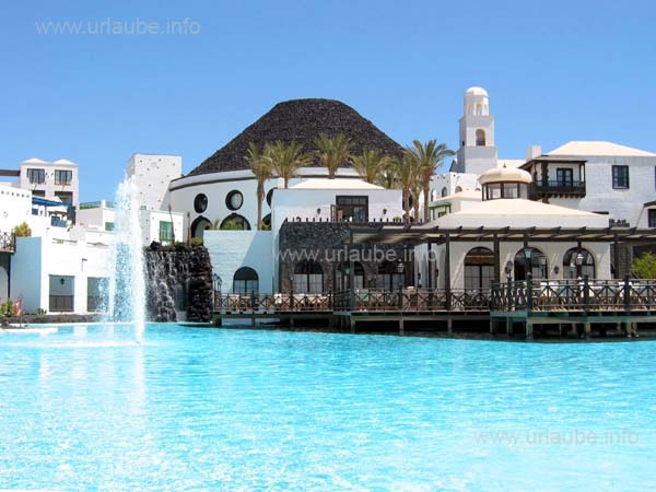 View over the big pool to the volcano owned by the hotel