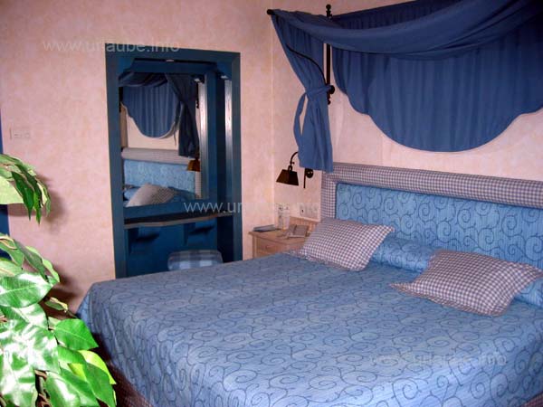 A huge double bed that was made twice a day