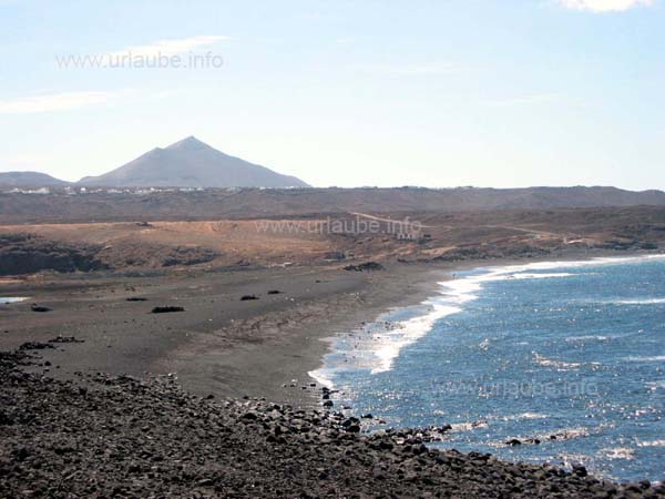 The long extended black bach at the Salinas de Janubio