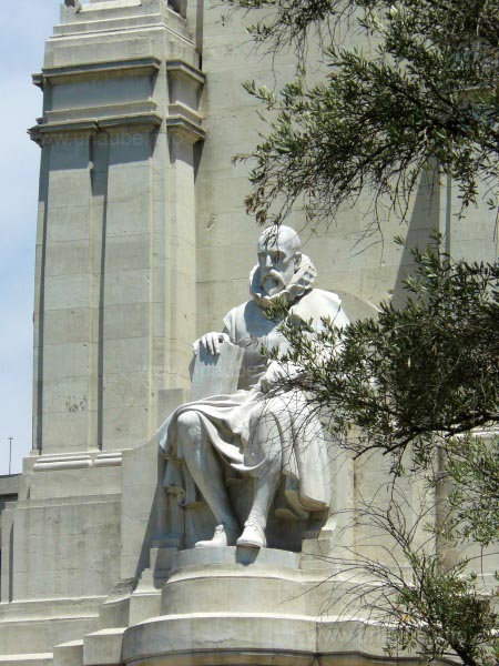 Cervantes looks from above down to Don Quijote and his knave