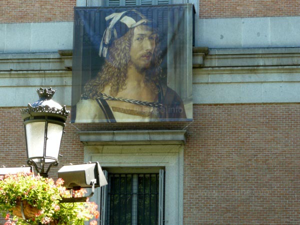 A copy of a painting on linen at the outer wall of the Prado
