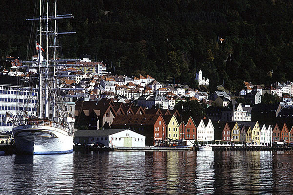 The former trade ship Statsraad Lehmkuhl, one of the biggest important three-master on earth, in front of the Hanseatic district Bryggen (taken at daytime)