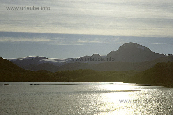 In the matutinal back light: Trolltinden and Svartisen glacier