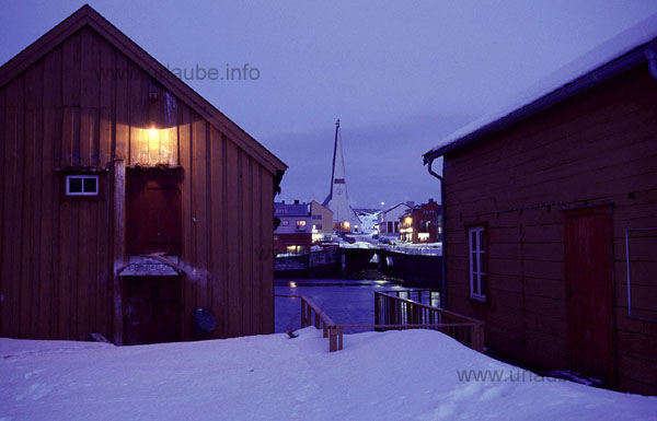 Old buildings at the harbour of Vard&ouml; and the new church of 1958. The old chapel and and 2/3 of the city were destroyed in the year 1944.