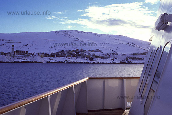 Enter into the harbour of Hammerfest. At the left, the distinctive building of the St. Michaels Church