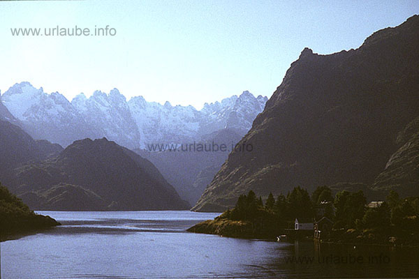 In the Raftsund. In the background of the peaks covered with snow, there is the entrance into the Troll fjord.