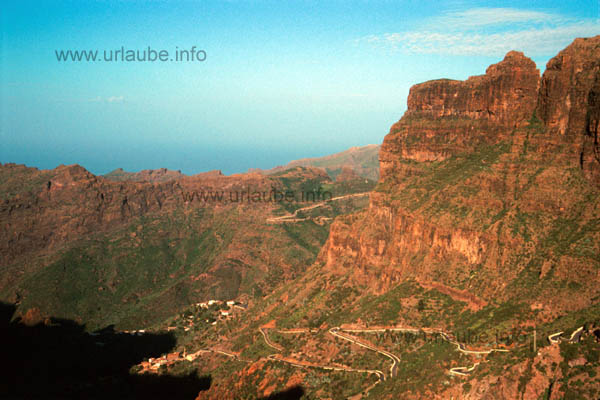 Road to Masca and the place itself; at the backmost mountain slope the road of Macsca to Buenavista is visible