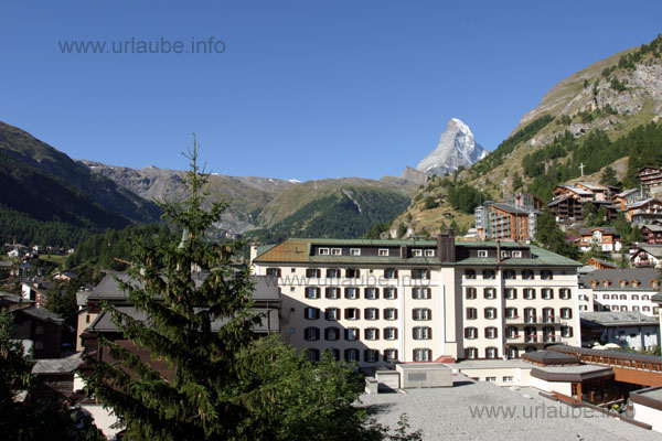 Our daily view from the balcony; what more would you want? At the very bottom, there is the swimming pool, behind it, the Hotel Mont Cervin