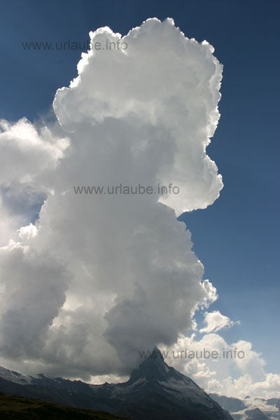 It is amazing how tiny the big Matterhorn appears compared to the heap cloud right above it