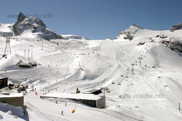 The ski area Theodul Glacier viewed from the station Trockener Steg (2939 m), at the left, the Klein Matterhorn