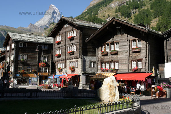 Church square of Zermatt with renewed Walser houses
